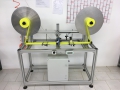 Машина за развиване, печатане и навиване на текстилни ленти